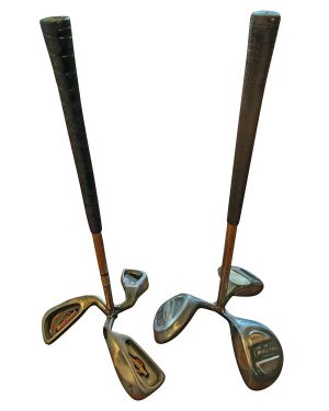Golf-Themed-Toilet-Paper-Holder—Made-from-Recycled-Golf-Clubs a pair of toilet paper roll holders made out of old golf clubs